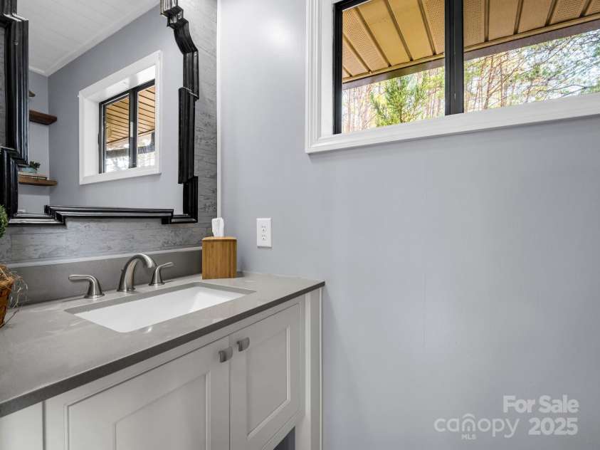 142 Palmer Place, Lake Lure, NC 28746.  MLS# CAR4218930, YatesRealty ID 25439. 