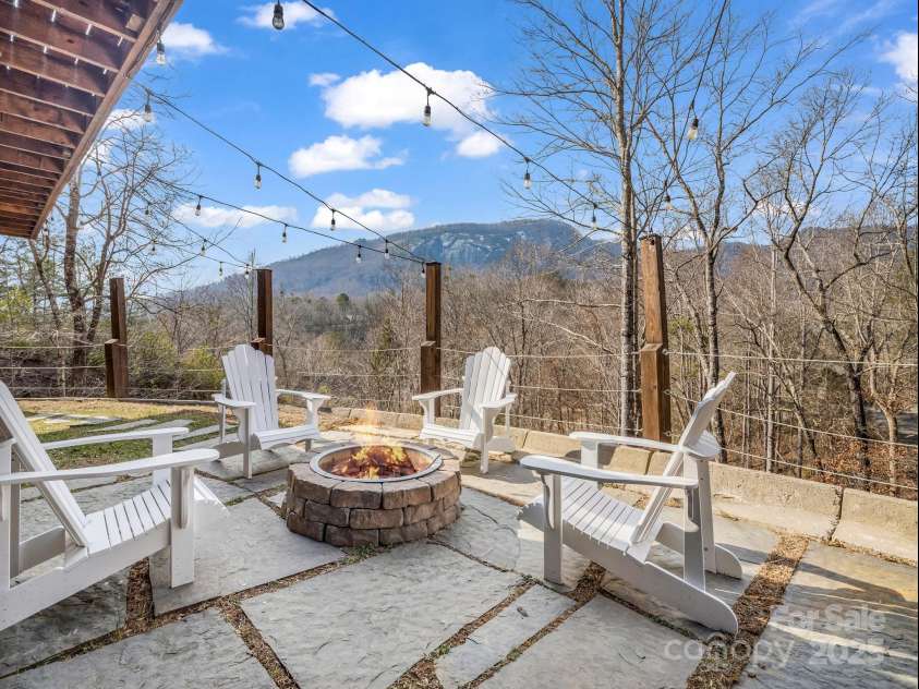 142 Palmer Place, Lake Lure, NC 28746.  MLS# CAR4218930, YatesRealty ID 25439. 