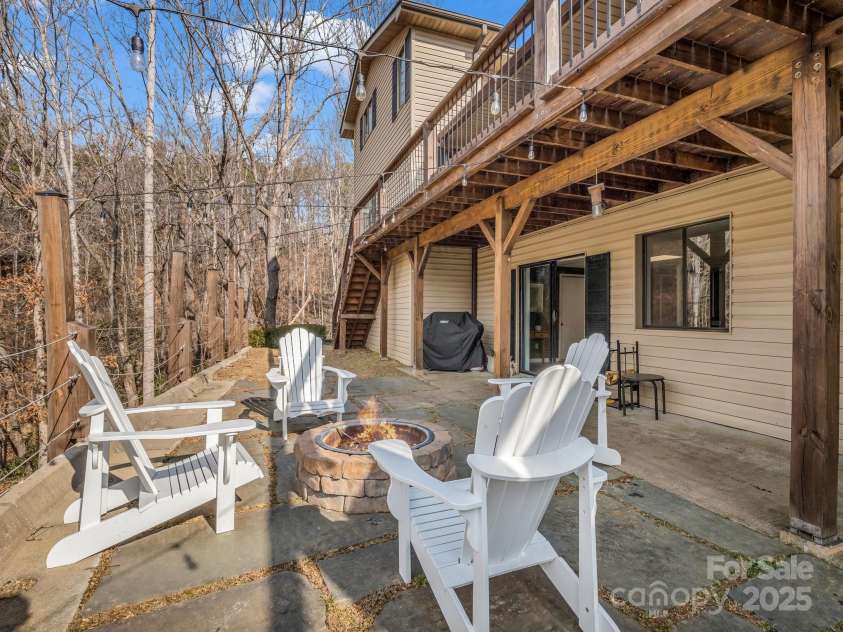 142 Palmer Place, Lake Lure, NC 28746.  MLS# CAR4218930, YatesRealty ID 25439. 