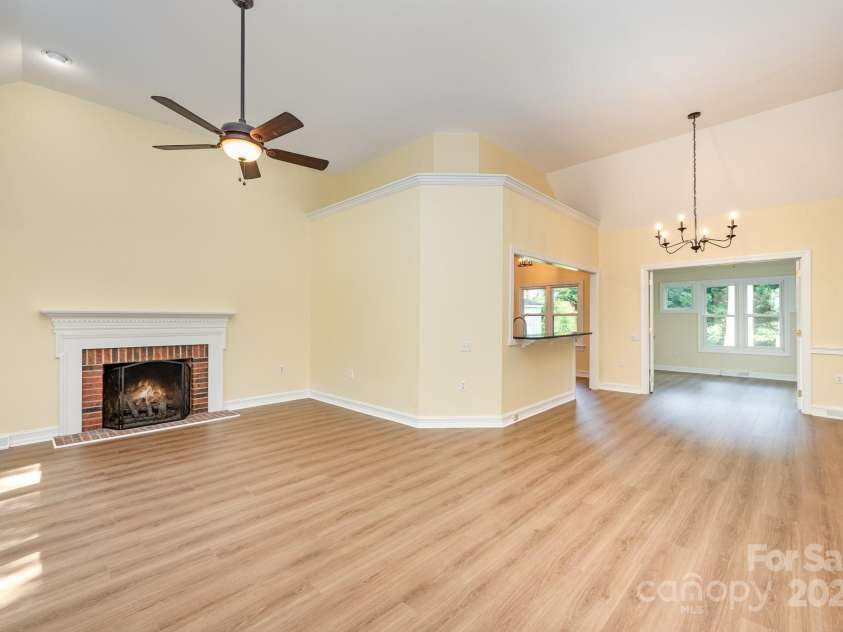 975 Pine Knoll Road, Fort Mill, SC 29715.  MLS# CAR4274032, YatesRealty ID 25440. Living room opens to the oversized dining area and kitchen