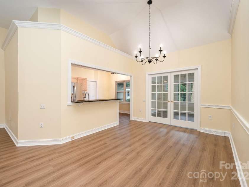 975 Pine Knoll Road, Fort Mill, SC 29715.  MLS# CAR4274032, YatesRealty ID 25440. Updated lighting and direct access to sunroom