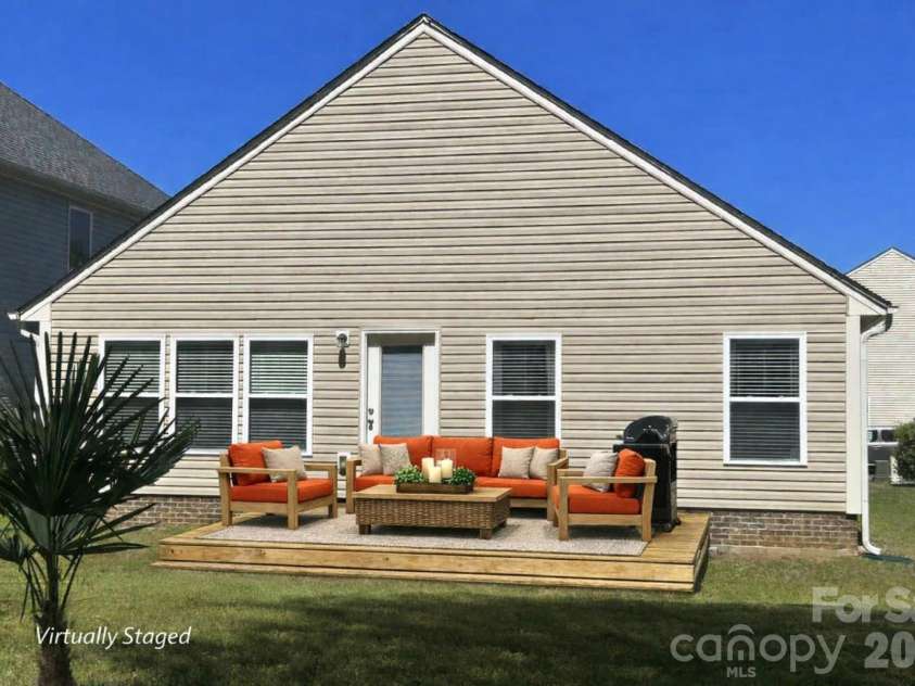 272 Abigail Court, Rock Hill, SC 29730.  MLS# CAR4367439, YatesRealty ID 25447. Backyard deck virturally staged