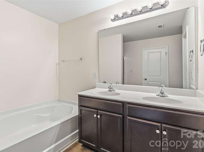 4148 Long Arrow Drive, Concord, NC 28025.  MLS# CAR4384354, YatesRealty ID 25448. Ensuite with Dual Sinks