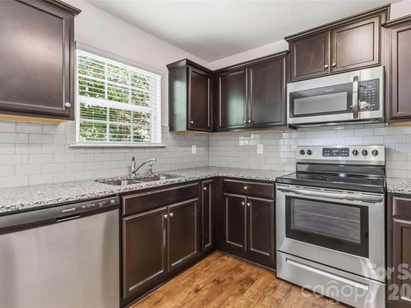 4148 Long Arrow Drive, Concord, NC 28025.  MLS# CAR4384354, YatesRealty ID 25448. Kitchen with Stainless Steel Appliances