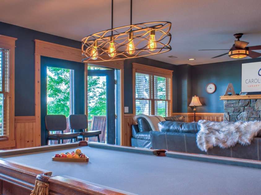 181 Scenic Wolf Drive, Mars Hill, NC 28754.  MLS# CAR4380057, YatesRealty ID 25449. Basement Rec Room w/ Access to lower Deck