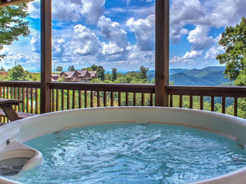 181 Scenic Wolf Drive, Mars Hill, NC 28754.  MLS# CAR4380057, YatesRealty ID 25449. Hot Tub on Lower Deck