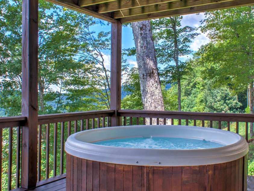 181 Scenic Wolf Drive, Mars Hill, NC 28754.  MLS# CAR4380057, YatesRealty ID 25449. Hot Tub on lower deck