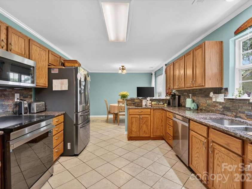 73 Ashton Bluff Circle, Mount Holly, NC 28120.  MLS# CAR4280326, YatesRealty ID 25451. 