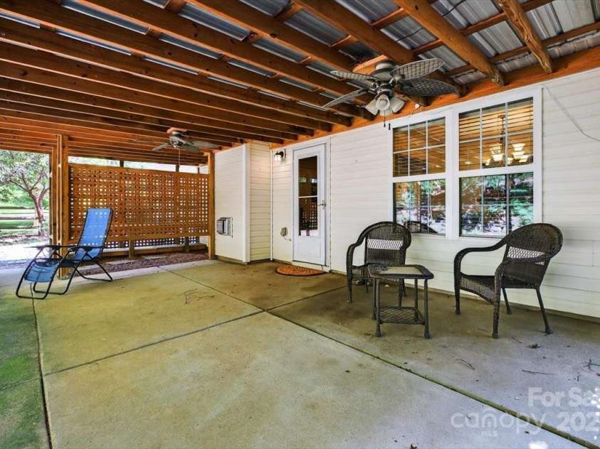 73 Ashton Bluff Circle, Mount Holly, NC 28120.  MLS# CAR4280326, YatesRealty ID 25451. Covered Back Porch