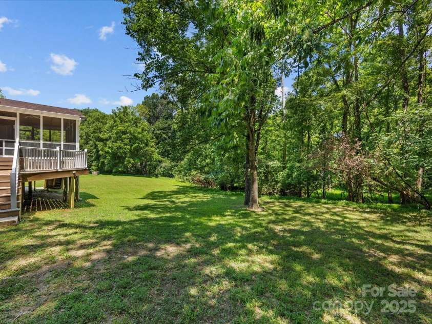 4601 Bournewood Lane, Charlotte, NC 28226.  MLS# CAR4278475, YatesRealty ID 25454. So close to everything Charlotte has to offer yet so peaceful!