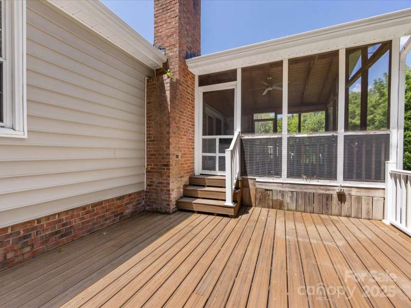 4601 Bournewood Lane, Charlotte, NC 28226.  MLS# CAR4278475, YatesRealty ID 25454. The deck offers space to grill and entertain outside!