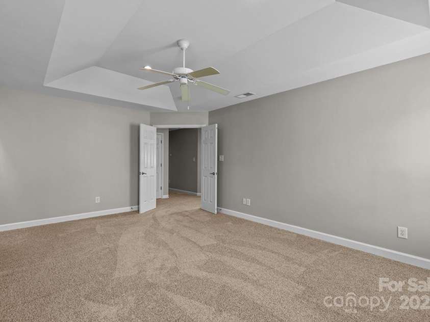 1504 Jekyll Lane, Waxhaw, NC 28173.  MLS# CAR4277908, YatesRealty ID 25455. Primary bedroom w/ trey ceiling