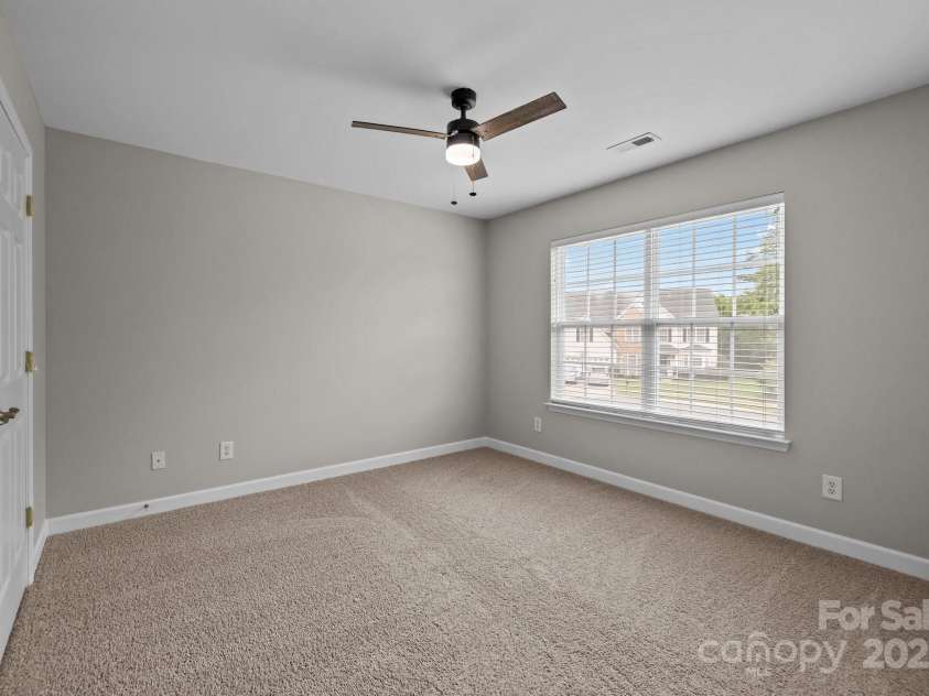 1504 Jekyll Lane, Waxhaw, NC 28173.  MLS# CAR4277908, YatesRealty ID 25455. Secondary bedroom #3 upstairs