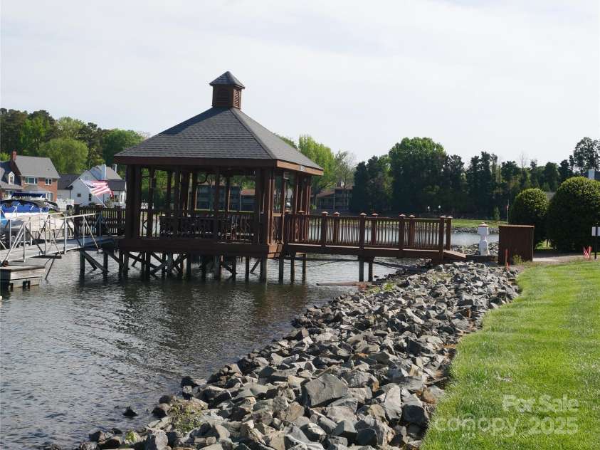 7626 Vistaview Drive, Cornelius, NC 28031.  MLS# CAR4247713, YatesRealty ID 25457. Well maintained rip rap at waterfront