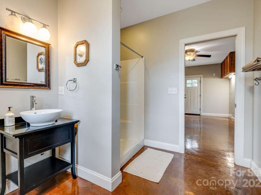 19 Albemarle Road, Asheville, NC 28801.  MLS# CAR4269476, YatesRealty ID 25459. Bathroom/ laundry attached to office