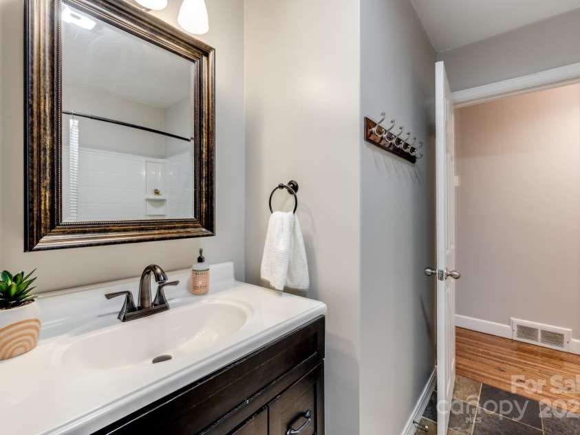 19 Albemarle Road, Asheville, NC 28801.  MLS# CAR4269476, YatesRealty ID 25459. Guest Bathroom