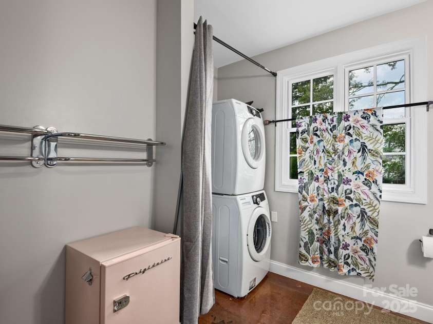 19 Albemarle Road, Asheville, NC 28801.  MLS# CAR4269476, YatesRealty ID 25459. Laundry room in the office suite full bathroom