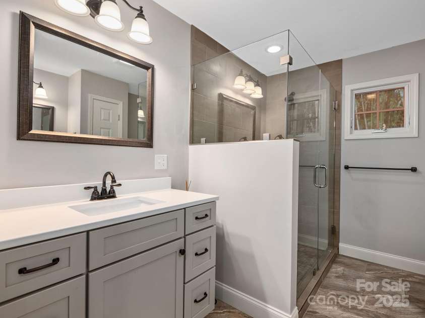 19 Albemarle Road, Asheville, NC 28801.  MLS# CAR4269476, YatesRealty ID 25459. Primary Bath