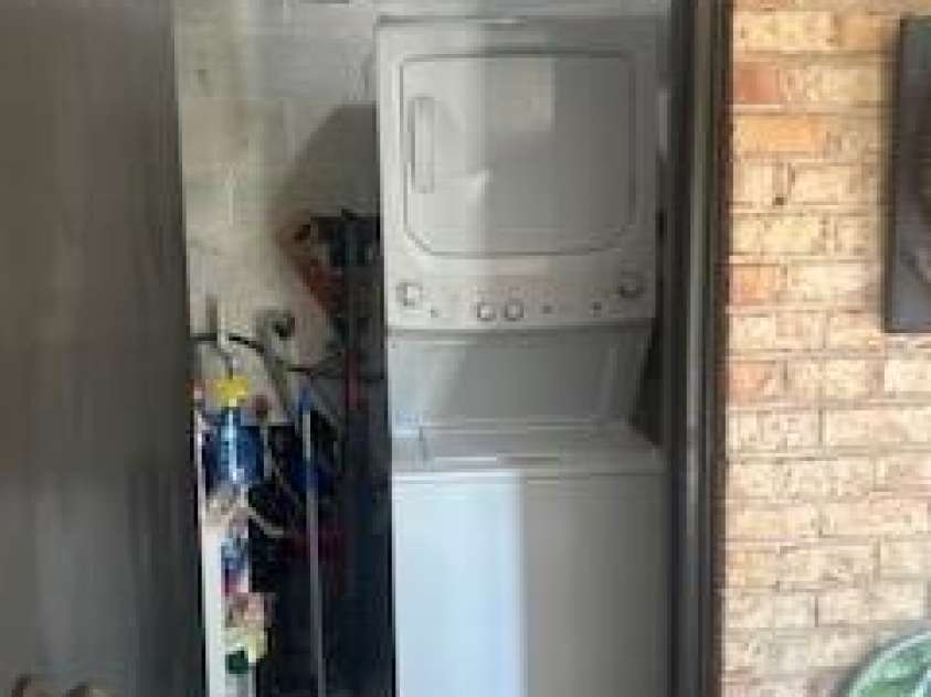 4537 Swan Meadow Lane, Charlotte, NC 28226.  MLS# CAR4273362, YatesRealty ID 25461. Washer and dryer in the utility closet in the sunroom convey with sale of home.