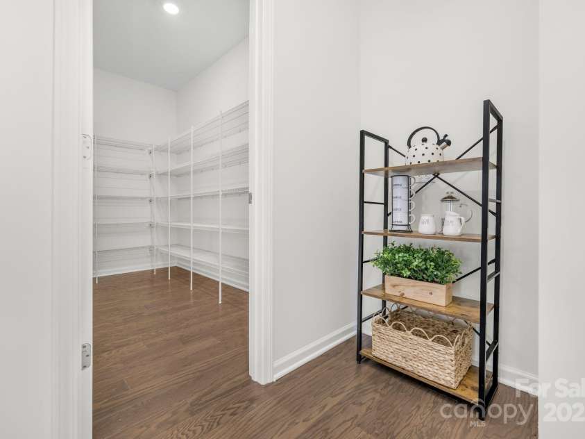 17203 Summers Walk Boulevard, Davidson, NC 28036.  MLS# CAR4278248, YatesRealty ID 25464. Back hall and pantry as you come in from the garage