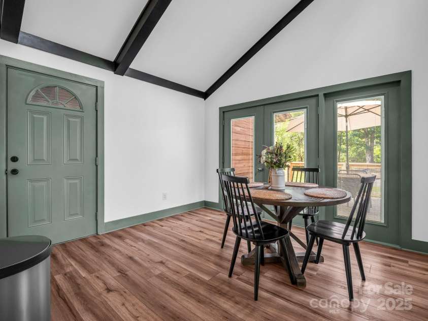 1171 Clark Road, Rutherfordton, NC 28139.  MLS# CAR4263600, YatesRealty ID 25465. Dining area between the garage, expansive deck and kitchen, PLUS the living room! Very easy flowing!