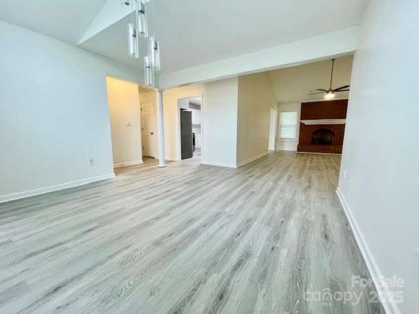 205 Hidden Spring Drive, Salisbury, NC 28147.  MLS# CAR4280315, YatesRealty ID 25468. Dinning Room looking into living room