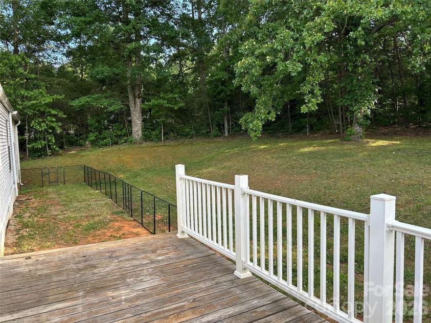 370 Walker Road, Nebo, NC 28761.  MLS# CAR4383415, YatesRealty ID 25472. Back deck and yard!