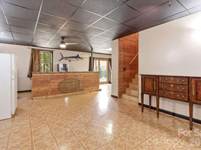 152 Rivercliff Drive, Stony Point, NC 28678.  MLS# CAR4385217, YatesRealty ID 25479. Basement Rec Room