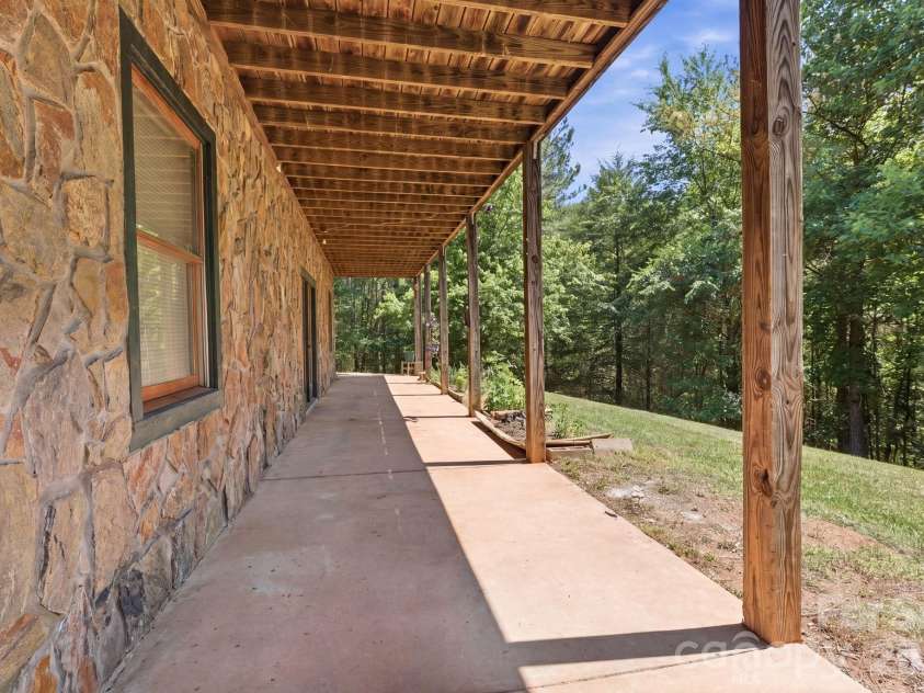 152 Rivercliff Drive, Stony Point, NC 28678.  MLS# CAR4385217, YatesRealty ID 25479. Covered Lower Patio