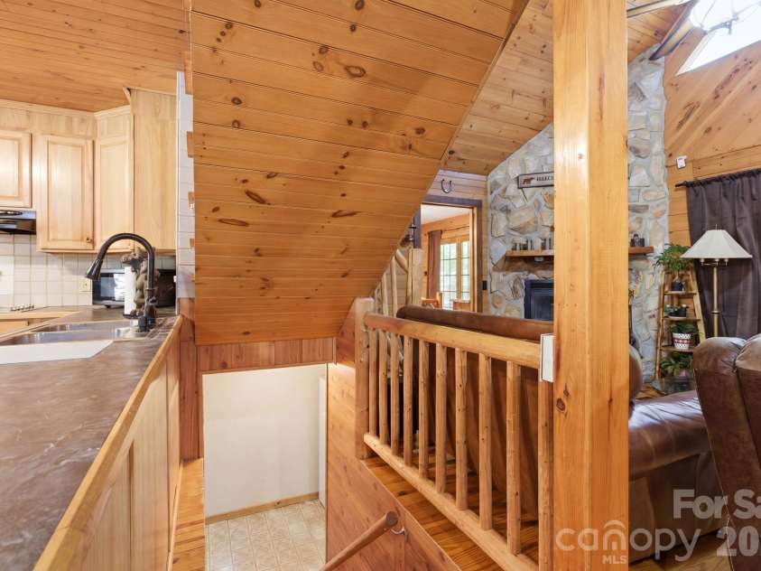 152 Rivercliff Drive, Stony Point, NC 28678.  MLS# CAR4385217, YatesRealty ID 25479. Stairs to Downstairs