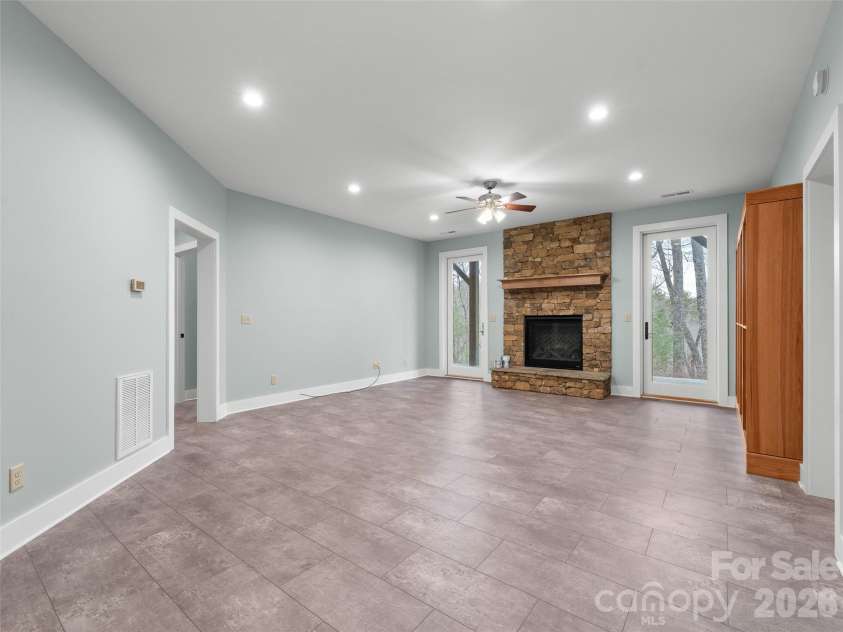 472 Cardinal Road, Brevard, NC 28712.  MLS# CAR4339828, YatesRealty ID 2548. Basement Den