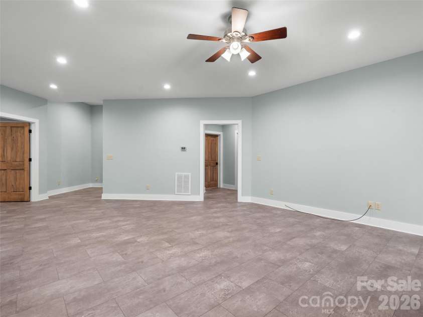 472 Cardinal Road, Brevard, NC 28712.  MLS# CAR4339828, YatesRealty ID 2548. Basement Den