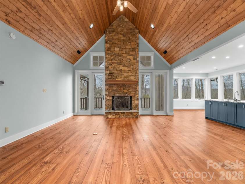 472 Cardinal Road, Brevard, NC 28712.  MLS# CAR4339828, YatesRealty ID 2548. Living Room and Dining Area / Kitchen