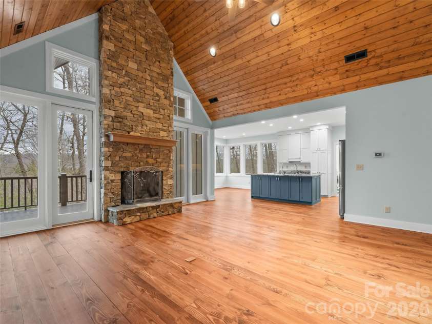 472 Cardinal Road, Brevard, NC 28712.  MLS# CAR4339828, YatesRealty ID 2548. Living Room and Dining Area / Kitchen