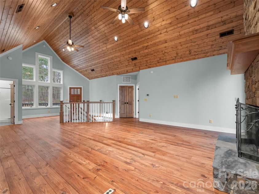 472 Cardinal Road, Brevard, NC 28712.  MLS# CAR4339828, YatesRealty ID 2548. Living Room and Entry
