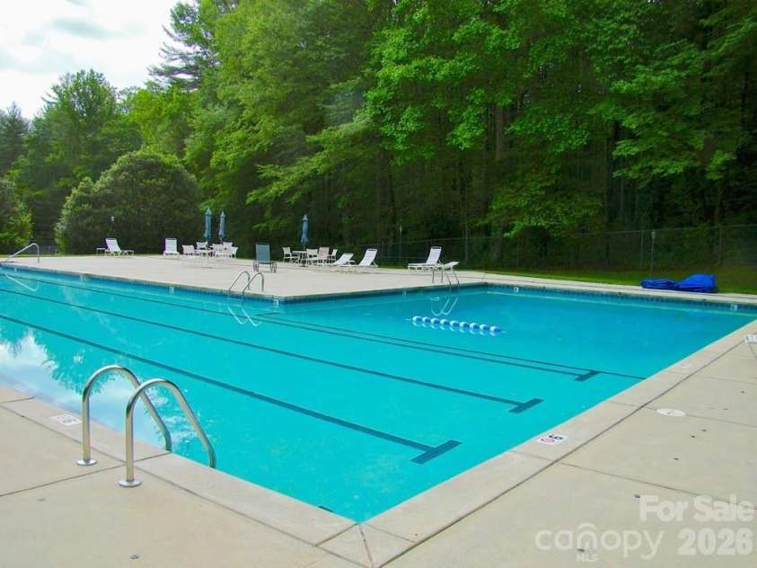 472 Cardinal Road, Brevard, NC 28712.  MLS# CAR4339828, YatesRealty ID 2548. Olympic size community pool