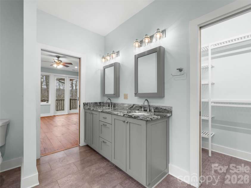 472 Cardinal Road, Brevard, NC 28712.  MLS# CAR4339828, YatesRealty ID 2548. Primary Bathroom and Walk-In Closet
