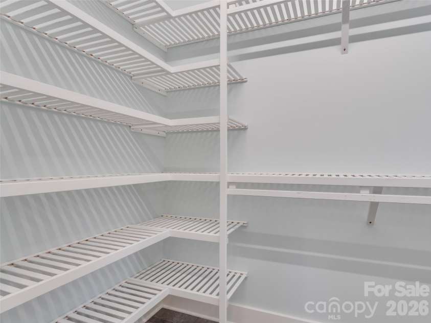 472 Cardinal Road, Brevard, NC 28712.  MLS# CAR4339828, YatesRealty ID 2548. Primary Bathroom Walk-In Closet