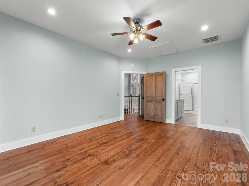 472 Cardinal Road, Brevard, NC 28712.  MLS# CAR4339828, YatesRealty ID 2548. Primary Bedroom and Bathroom