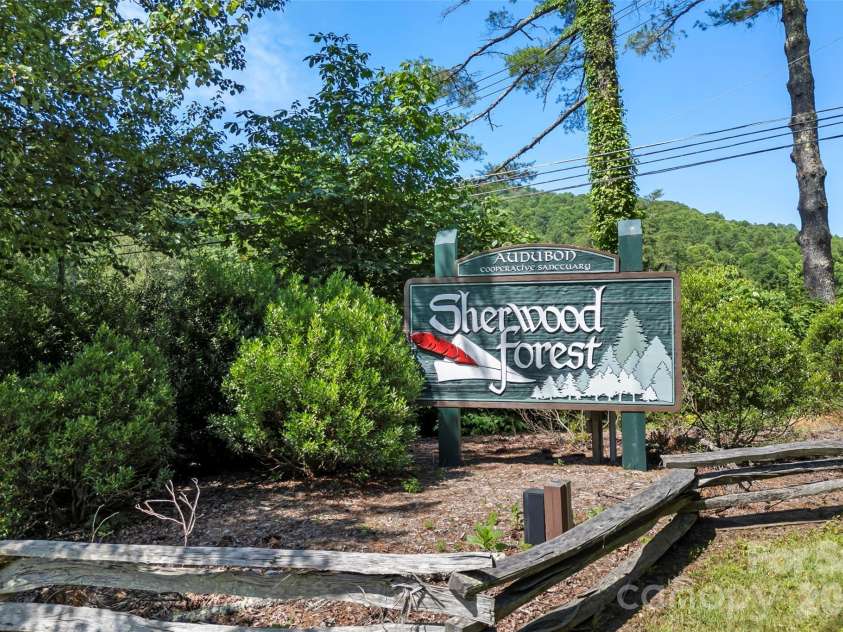 472 Cardinal Road, Brevard, NC 28712.  MLS# CAR4339828, YatesRealty ID 2548. Sherwood Forest Sign