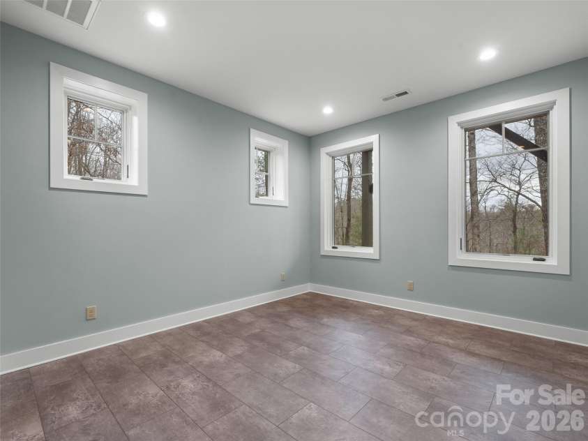 472 Cardinal Road, Brevard, NC 28712.  MLS# CAR4339828, YatesRealty ID 2548. Third Bedroom  (Basement)