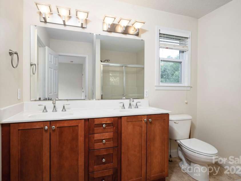 29 Honey Hollow Lane, Fairview, NC 28730.  MLS# CAR4270487, YatesRealty ID 25480. Primary bathroom with double sink