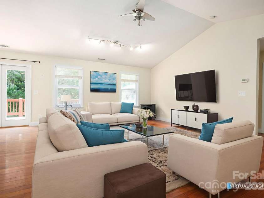29 Honey Hollow Lane, Fairview, NC 28730.  MLS# CAR4270487, YatesRealty ID 25480. Virtually staged living room
