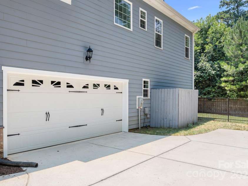 738 Kemp Road, Mooresville, NC 28117.  MLS# CAR4273057, YatesRealty ID 25481. 2 Car Heated & Cooled Garage