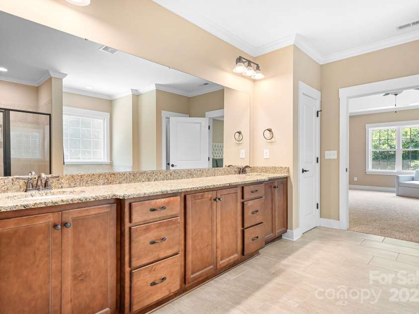 738 Kemp Road, Mooresville, NC 28117.  MLS# CAR4273057, YatesRealty ID 25481. Primary Bathroom With 2 walk in closets