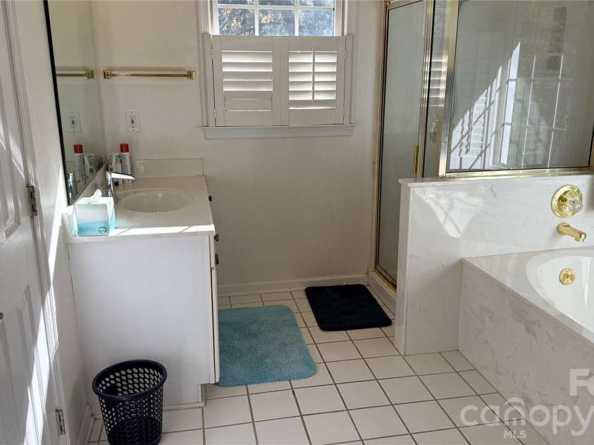 2836 Pickering Road, Greensboro, NC 27407.  MLS# CAR4275274, YatesRealty ID 25483. Ensuite primary bathroom