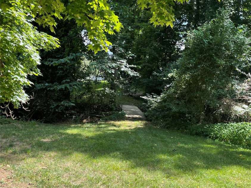 2836 Pickering Road, Greensboro, NC 27407.  MLS# CAR4275274, YatesRealty ID 25483. Greenway around lake