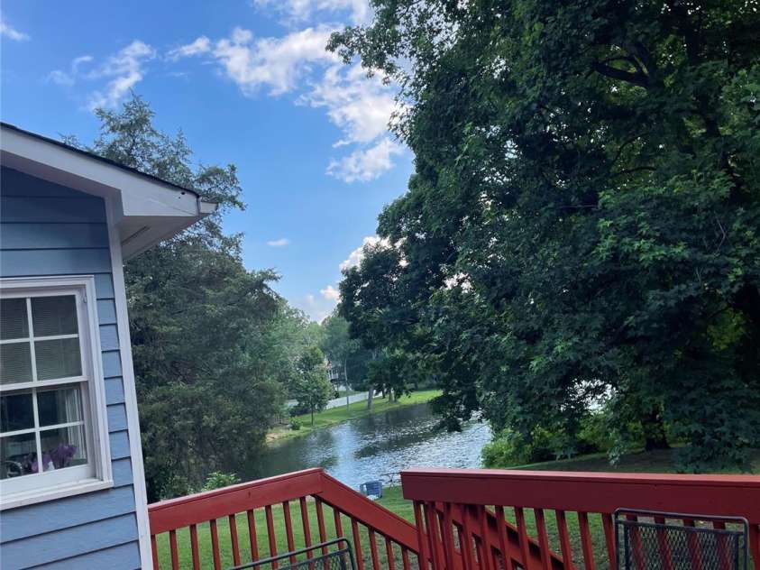 2836 Pickering Road, Greensboro, NC 27407.  MLS# CAR4275274, YatesRealty ID 25483. View of lake from deck