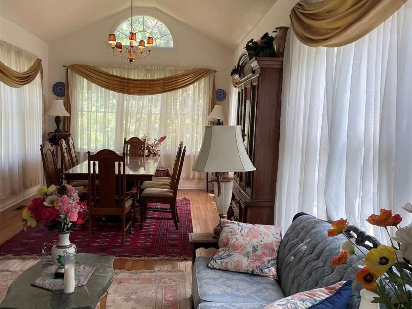 2836 Pickering Road, Greensboro, NC 27407.  MLS# CAR4275274, YatesRealty ID 25483. View of living room from kitchen