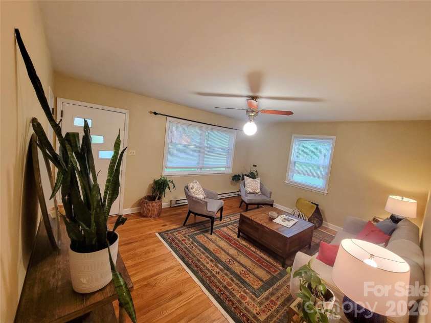 45 Browndale Road, Asheville, NC 28805.  MLS# CAR4383844, YatesRealty ID 25484. Living Room from Kitchen